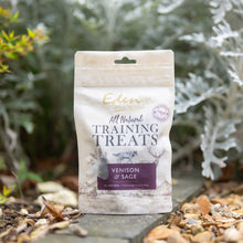 Eden Training Treats in a natural setting, featuring venison and sage for dog training rewards.