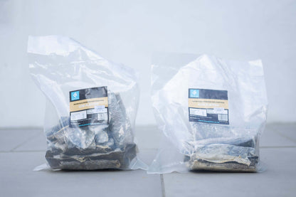 Two clear bags of Cod Skin Flatties for dogs, showcasing healthy, natural dog treats.
