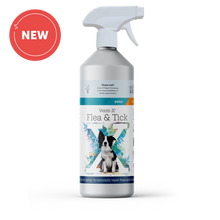 A white 250 ml trigger-spray bottle of Verm-X Flea & Tick Spray for dogs, with a white spray nozzle. The bottle has a blue and white label featuring the Verm-X logo, a black-and-white dog sitting in front of a large stylised X, and text describing it as a daily spray to naturally repel fleas and ticks.