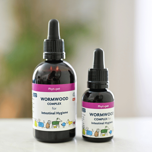 Two bottles of Wormwood Complex for intestinal hygiene, suitable for pets like puppies, kittens, and birds.